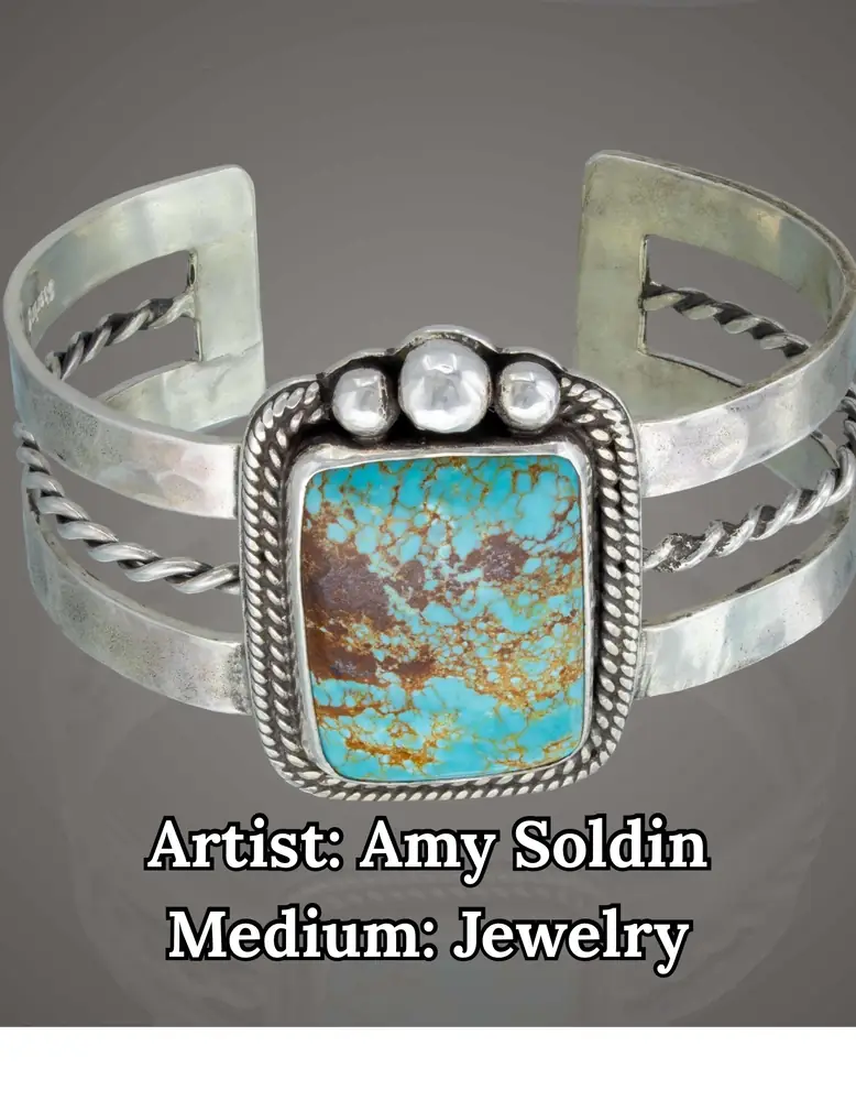 Silver cuff bracelet with a rectangular turquoise stone, by Amy Soldin