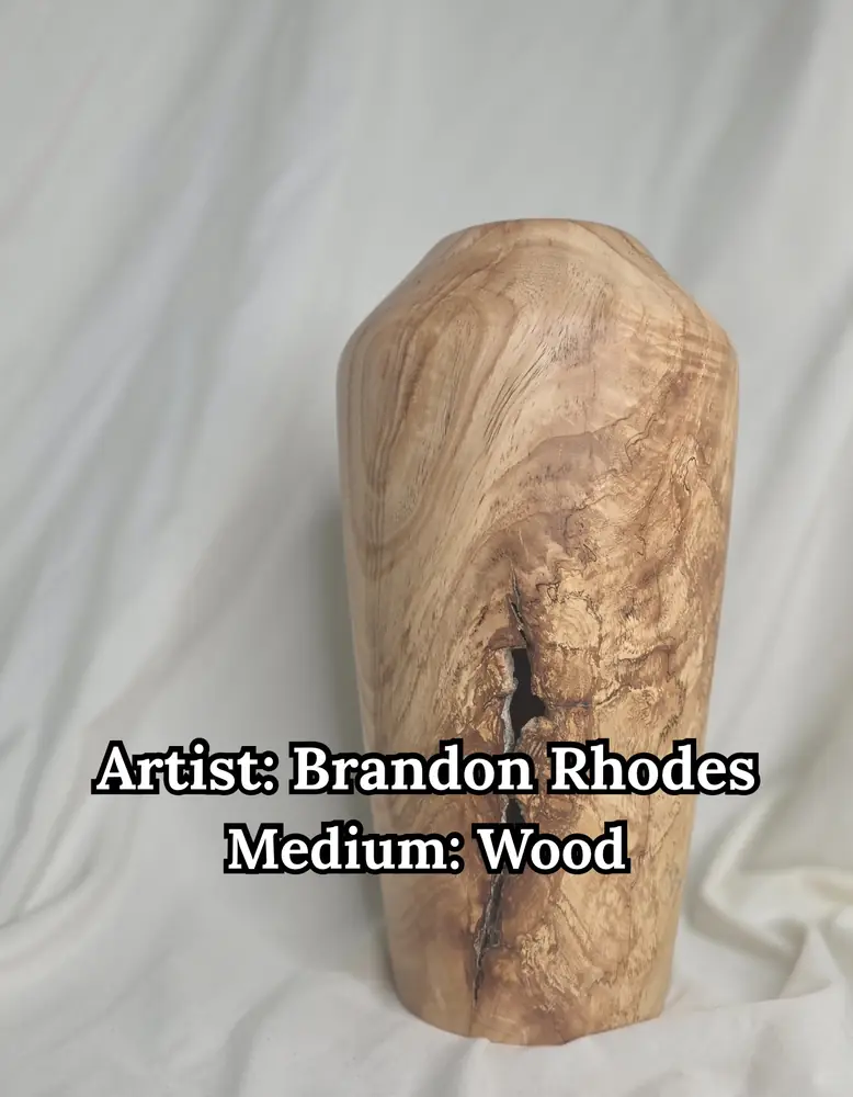 Turned spalted-wood vase with a natural crack, by Brandon Rhodes