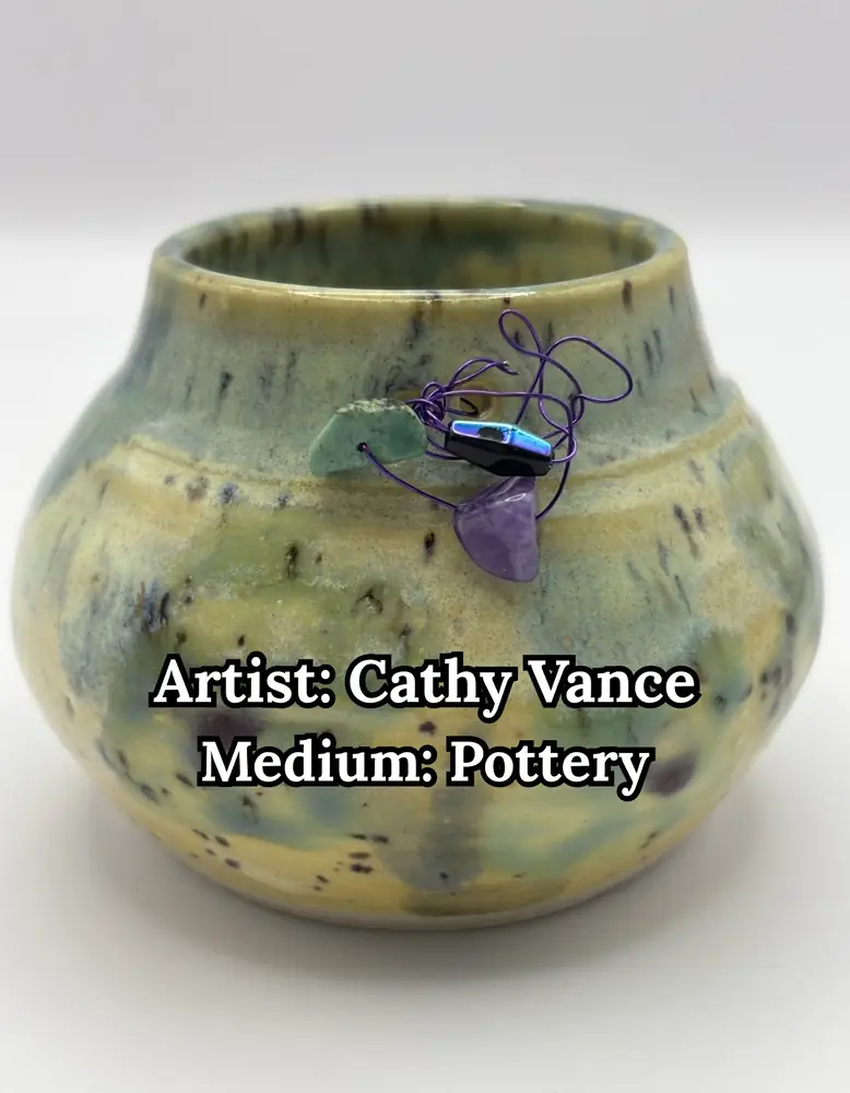 Round glazed pot in green and cream with wire-wrapped stones, by Cathy Vance