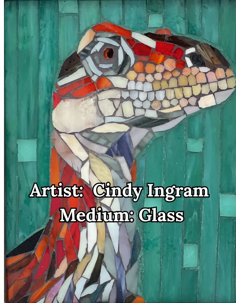 Colorful glass mosaic lizard against a teal background, by Cindy Ingram