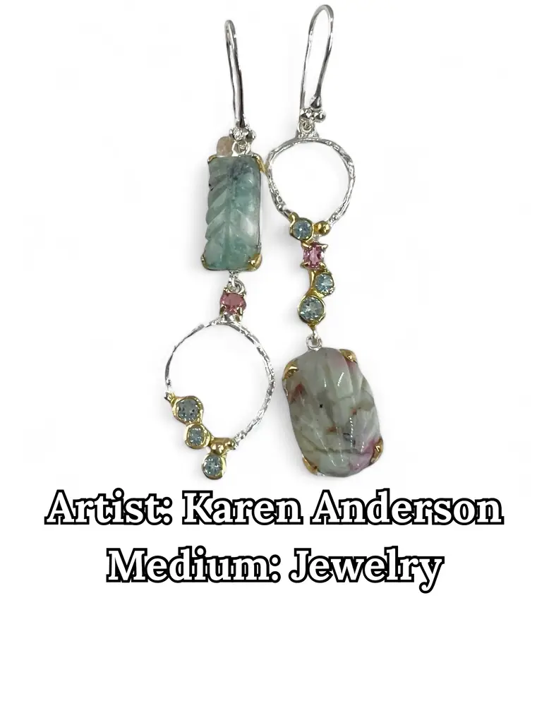 Silver drop earrings with carved green stones and pink gems, by Karen Anderson