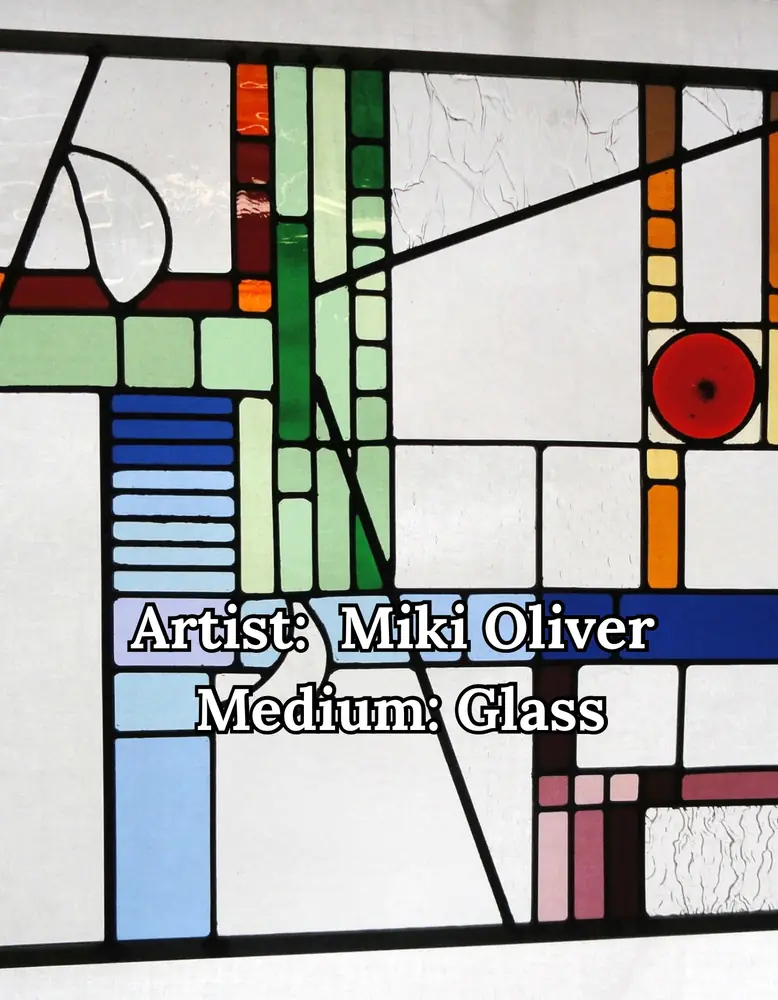Prairie-style stained-glass panel in greens, blues, and red, by Miki Oliver