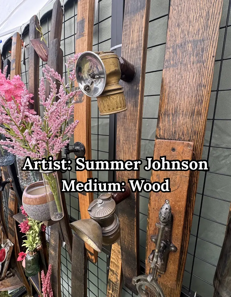 Barrel-stave wall hangings with vintage miner lamps, by Summer Johnson